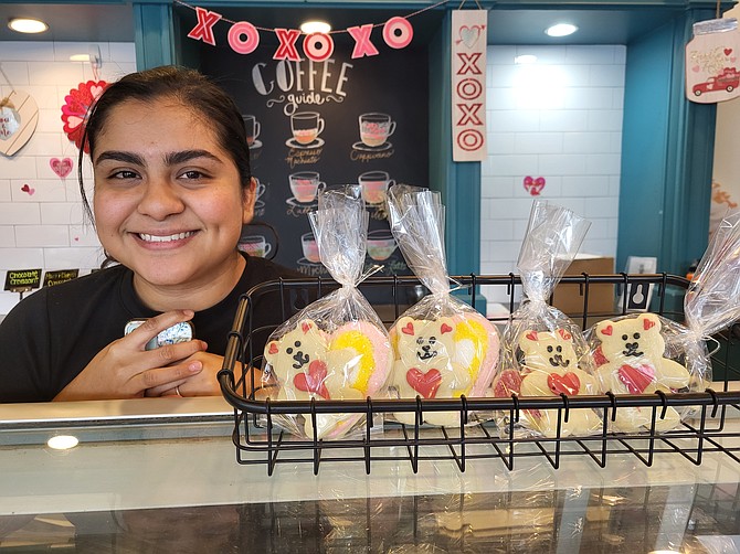 Amparo Sorto and her bears with hearts at Hollin Hall Pastry Shop.