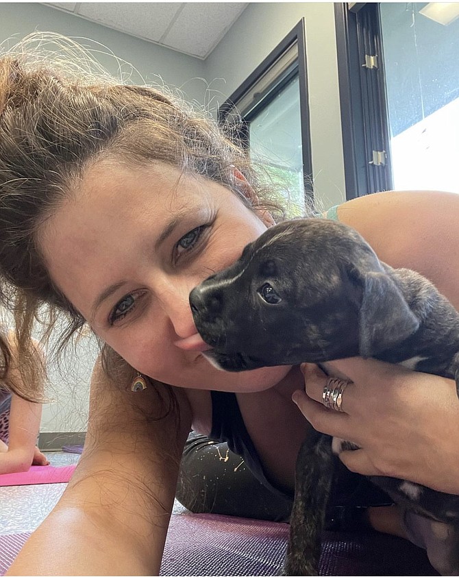 Beth Wolfe leads the kitten or puppy yoga classes, and is experienced in combining animals with yoga, even beyond kittens and puppies. @bethawolfe