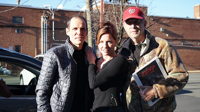 Filmmaker Michael Taylor, in the red hat, taking a break on the set with Joey Collins from Arlington and Ena O'Rourke who plays Carol in the movie.