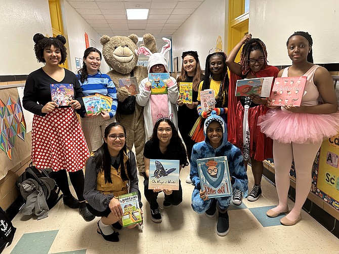 Alexandria City High School students dress as their favorite storybook characters at the Read Across America event March 2 at Charles Barrett Elementary School.