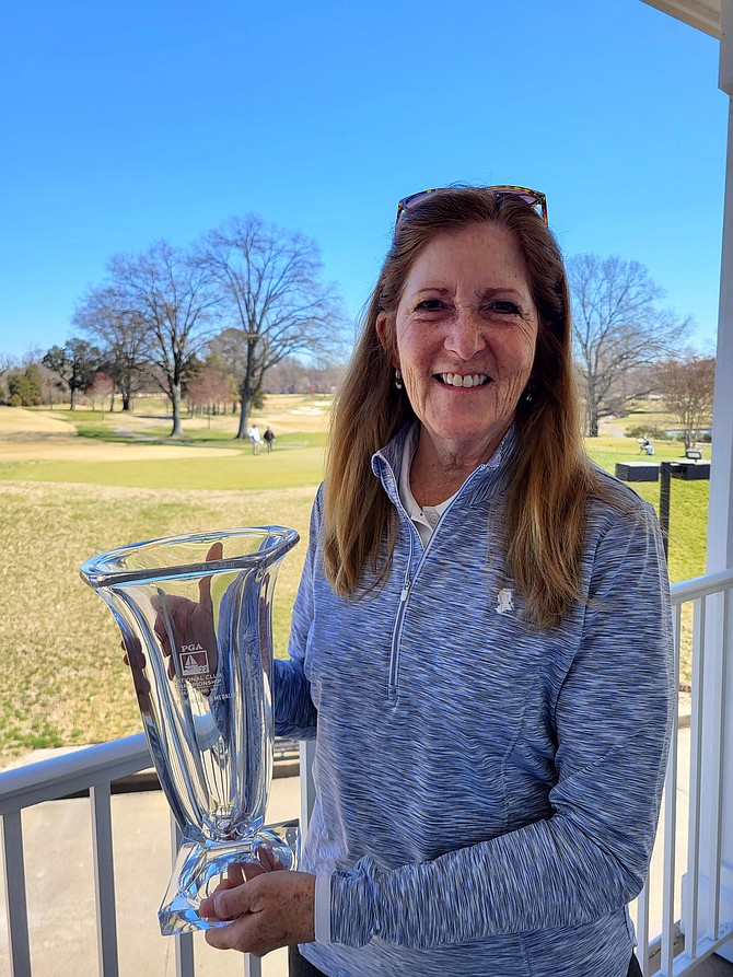 Joan Gardner with her trophy from the National Club Championship at Sea Island Resort in Sea Island, Georgia.