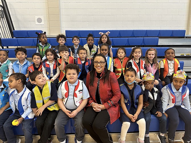 Acting ACPS superintendent Melanie Kay-Wyatt, center, poses with students in celebration of Essential Workers Appreciation week March 14 at Patrick Henry Elementary School.