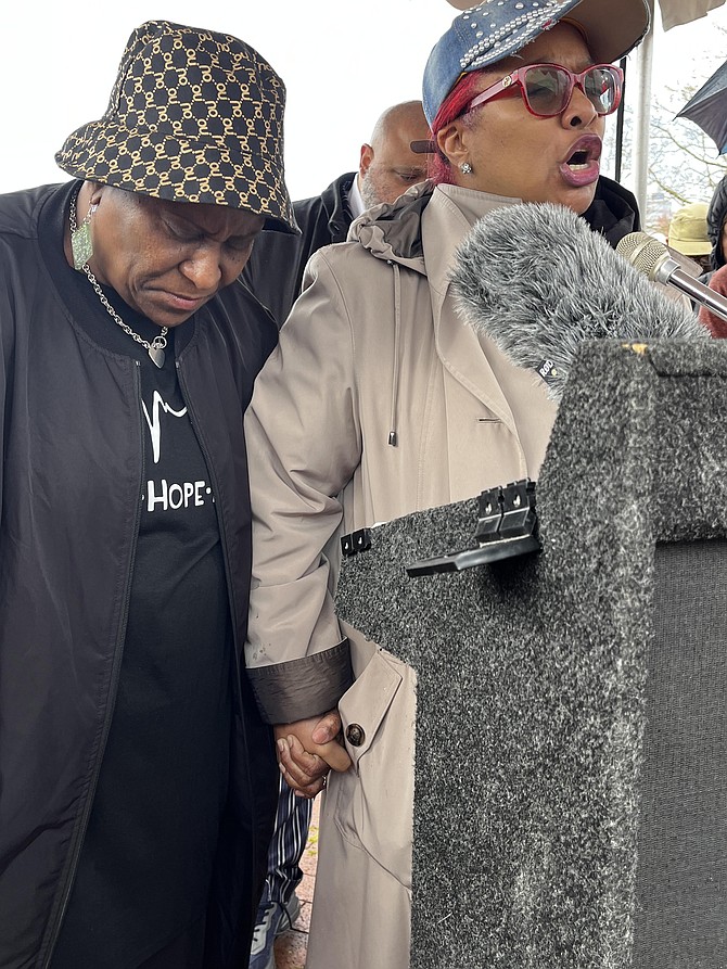 From left, Melissa Johnson, the mother of Timothy Johnson and Michelle Leete, president of the Fairfax County NAACP