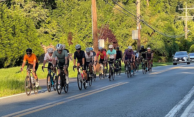 Serious bicyclists last summer on MacArthur Boulevard in Potomac. All riders are encouraged to wear a helmet.