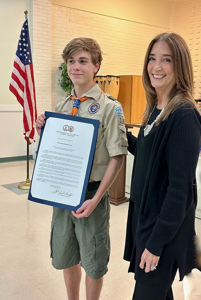 Patricia Cake receives her House commendation from Del. David Bulova
Photo courtesy G. Lynch