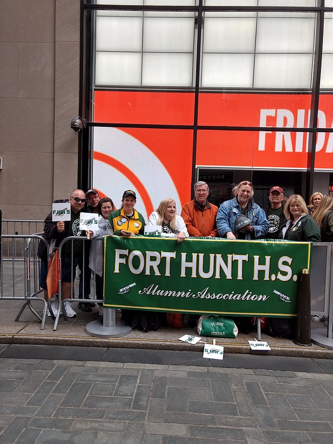 Keith Flanders, left, with fellow Fort Hunt alums outside 30 Rock in NYC.