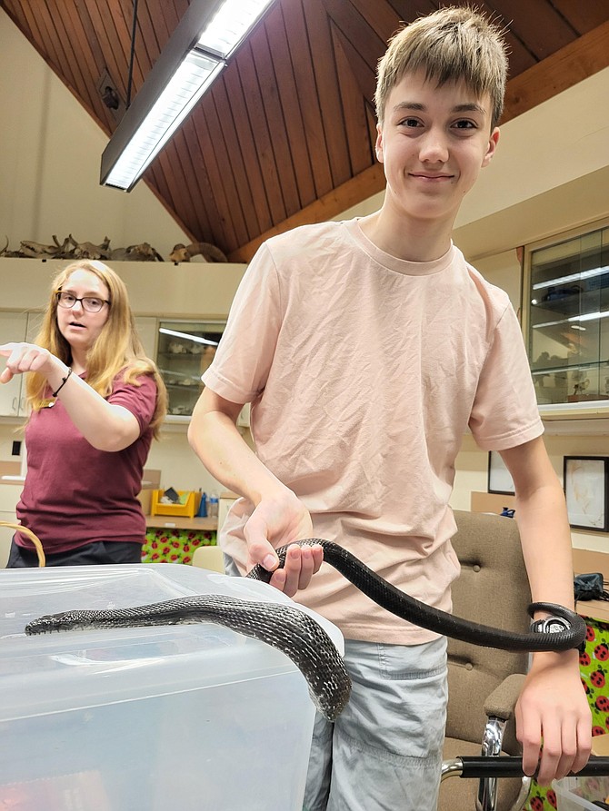 Inside the Nature Center, a black rat snake was one of the attractions.