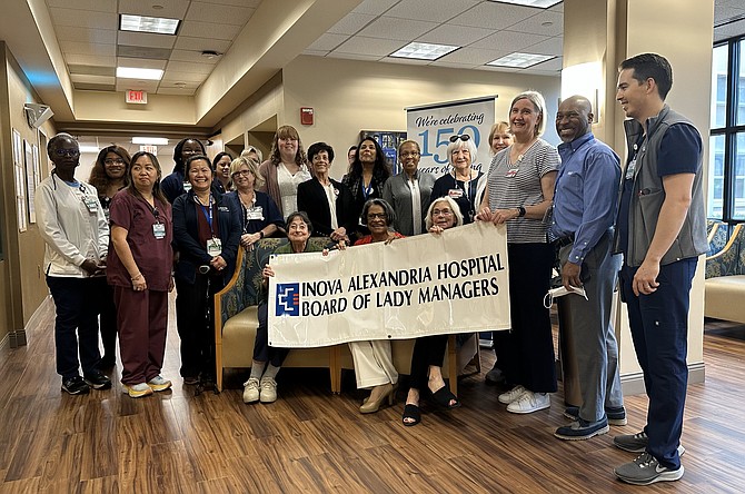 Staff of Inova Alexandria Hospital are joined by members of the Board of Lady Managers as the organization celebrates the health care providers May 10 as part of National Nurses Week.