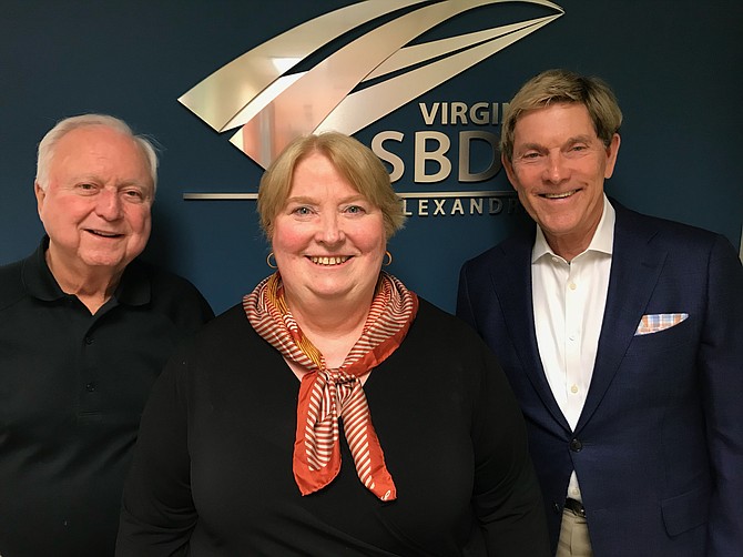 SBDC Assistant Director Gloria Flanagan, center, with SDBC business analyst Jack Parker and former SBDC executive director Bill Reagan in an undated photo. Flanagan died May 15 at the age of 70.