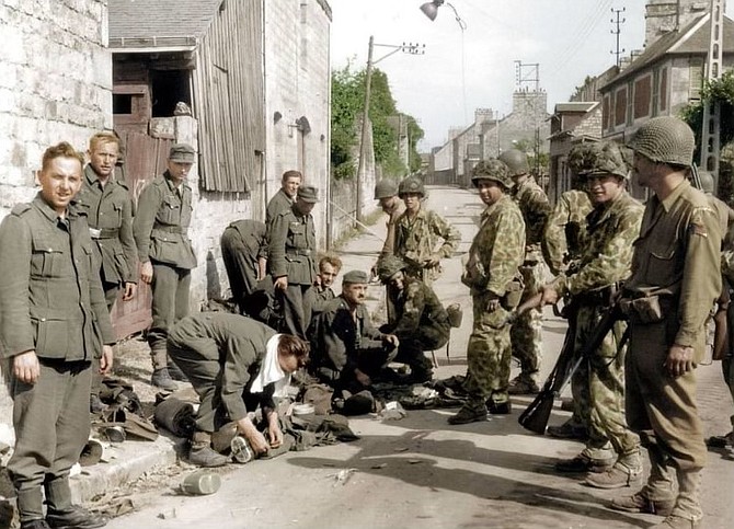 Members of the U.S. Army 41st Armored Infantry Regiment in France during World War II in an undated photo. Reenactors portrayed these soldiers at the 79th D-Day anniversary June 4 at Market Square.