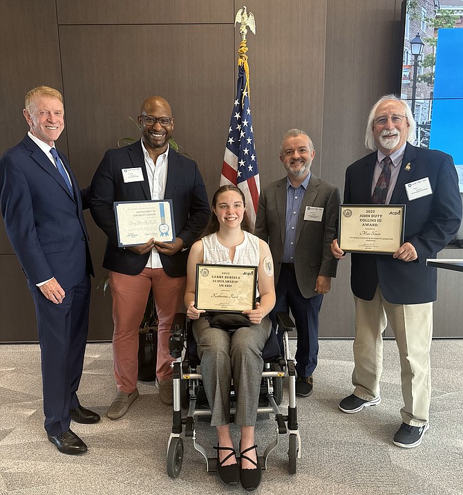 Recipients of the City of Alexandria and Chamber of Commerce Disability Awards gather with Chamber CEO Joe Haggerty, left, and Commission on Persons With Disabilities representative Jeffrey Pool, second from right, June 13 at the American Physical Therapy Association headquarters in Potomac Yard. Pictured are: Haggerty, Andre Atkins of Cherry Blossom Pace, recipient Katherine Radt, Pool and recipient Mac Slover.