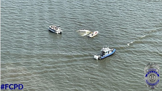 Fairfax County Marine Patrol Unit responds to a boat mishap in the Potomac River.