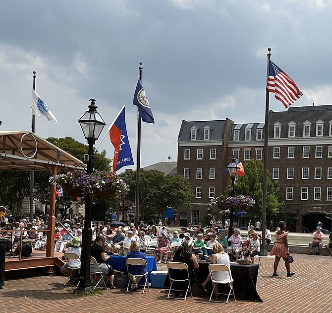 The Juneteenth flag, second from left, flies in Market Square as part of the city’s Juneteenth celebration program.