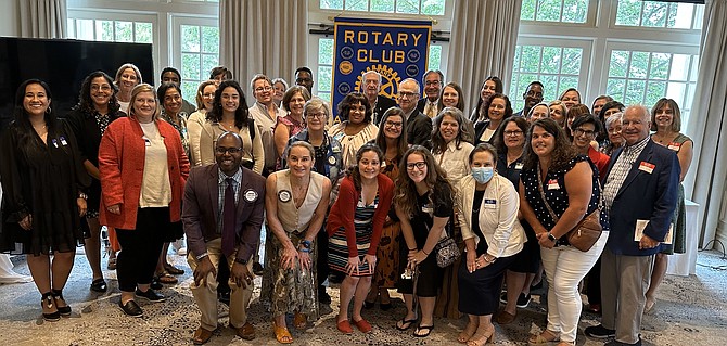 The Rotary Club of Alexandria held its annual Contributions Day June 20, presenting 26 area nonprofits with grants to advance literacy for children and adults and/or improve the lives of children, youth, seniors, and others with special needs within the city of Alexandria. Pictured are representatives of some of the organizations at the event at Belle Haven Country Club. www.alexandriarotary.org