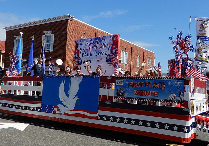 The first-place float carried out the parade’s theme, “Peace, Love & the Fourth of July.”
