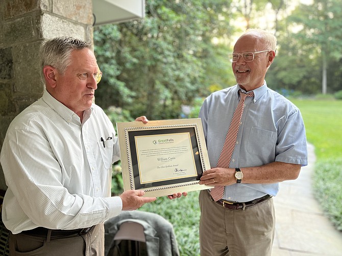 Far right, William “Bill” Canis, president of the Great Falls Citizens Association, accepts the Glen Sjoblom Award from Chris Rich, vice president and president-elect.