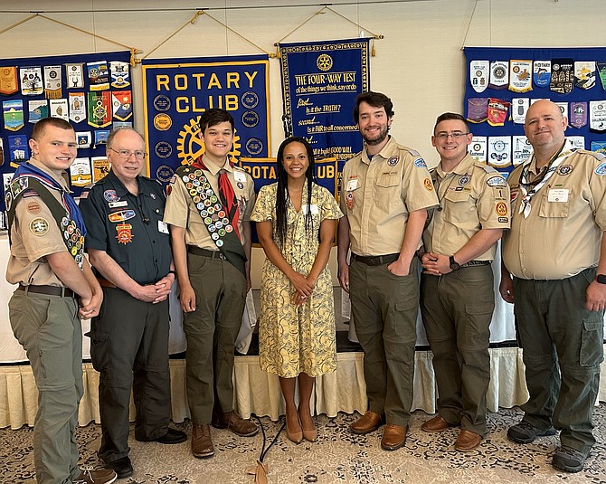 Alexandria Councilmember Alyia Gaskins, center, stands with Jack Reeder, Colonial District Chairman Vincent Kiernan, Caden Ritchie, Colin Tridone, Keenan Pallone, and Colonial District Commissioner Damon Baldini at the June 6 Alexandria Rotary Club luncheon at Belle Haven Country Club where each Eagle Scout was presented with a $1,500 scholarship.