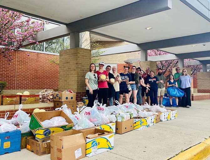 Volunteers for the SLHS PTSA Food Pantry ready for the ongoing weekly distribution surge. (File photo)