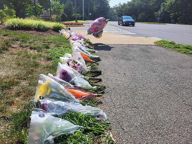 In the days following the fatal crash, there were over 30 bouquets of flowers, a few candles, stuffed bears, unicorns and balloons to honor the victims.