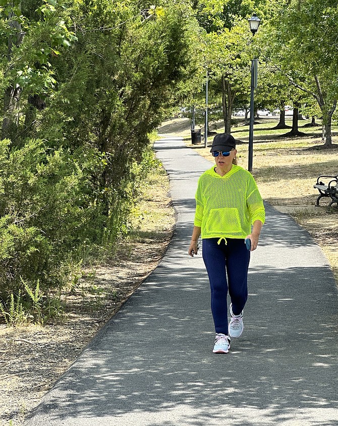 Resident Gayle Converse trains for the 133-mile “Women Going the Extra Mile” walk from Alexandria to Richmond to mark Women’s Equality Day Aug. 26.