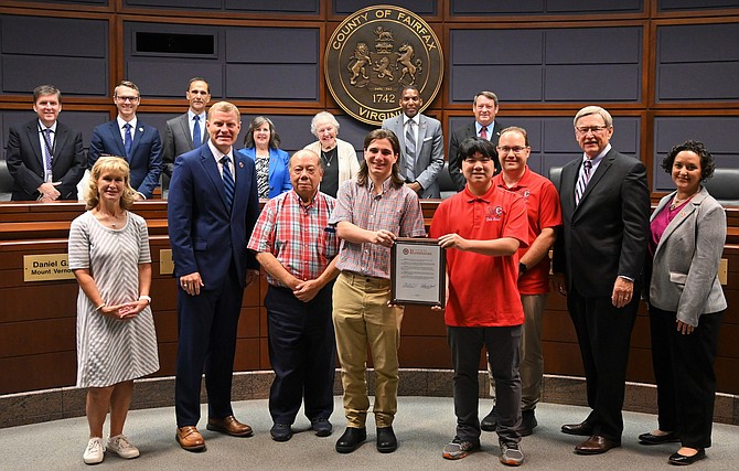 The Fairfax County Board of Supervisors present McLean High School It’s Academic Team with a Resolution recognizing their championship achievement, McLean High School team of Noah Chin, Ethan Zhou, Carter Pisocky, and alternate Andrew Evans.