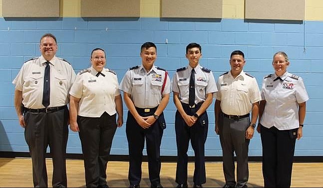 CAP Eaker awardees pose with chain of command following the awards ceremony Aug. 10 at the Fairfax Salvation Army. Pictured from left: Col. Eugene Egry, Mid-Atlantic Region Commander; Col. Elizabeth Sydow, Virginia Wing Commander; Cadet Lt. Col. Samuel Ten, Eaker Awardee; Cadet Lt. Col. Austin Martin, Eaker Awardee; Lt. Col. Daniel Brodsky, Virginia Wing Group 3 Commander; Capt. Sara Demyanovich, Burke Composite Squadron Commander.