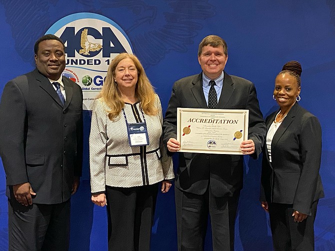 Chief Deputy Shelbert Williams, Accreditation Manager Gayle Reuter, Sheriff Sean Casey and ADA/PREA Coordinator Candra Callicott after receiving official accreditation from the American Correctional Association Aug. 11 in Philadelphia.
