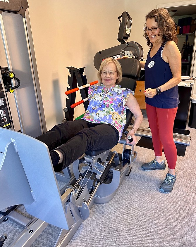 91-year old Leila Brown, a resident of the Virginian, works out with the community’s Fitness Director Maria Leonor Malca three days each week.