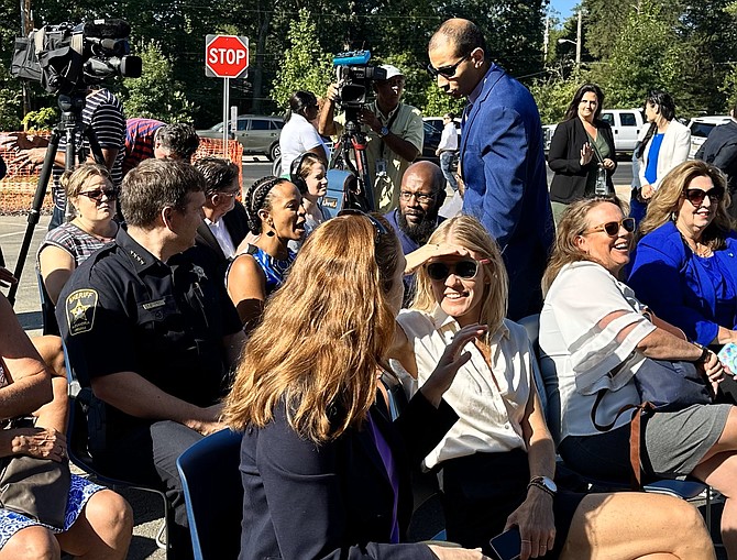 Mayor Justin Wilson greets elected officials and families at the Aug. 18 ribbon cutting of the new Douglas MacArthur Elementary School.