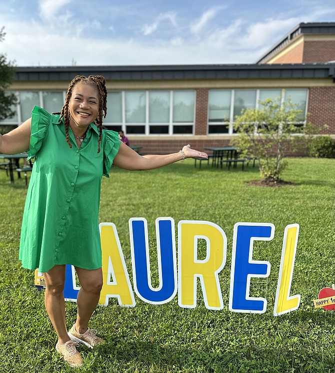 Principal Janice Dalton of Laurel Hill Elementary welcomes students with open arms.