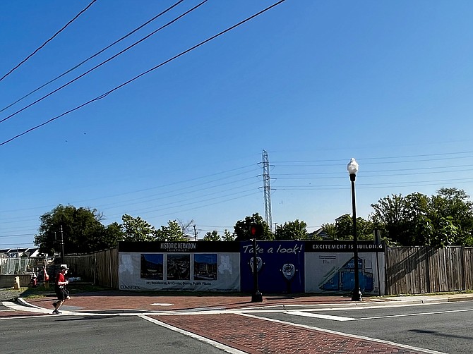 The site for the Comstock project has been fenced and bannered at the corner of Elden and Center streets since May 1, 2020.