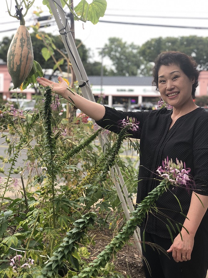 Jung Choe is proud of her garden, which she grows from seed, some donated by customers, some bought at Home Depot.