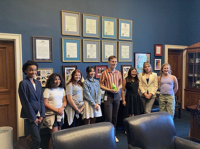 Students from Great Falls Elementary and Cooper Middle Schools meet with Jake Green in Representative Gerry Connolly’s office after presenting their petition. From left, Halia Ochieng, Emily Mosley, Izabel Richman, Peri Kim, Jake Green (Connolly staff), Maura Campione, Stella Scannell, Alexa Landi
