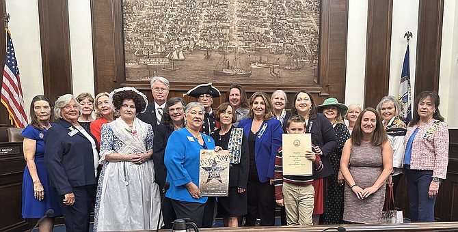 Members of the Daughters of the American Revolution are joined by school and city representatives in celebrating Constitution Day Sept. 19 at City Hall.