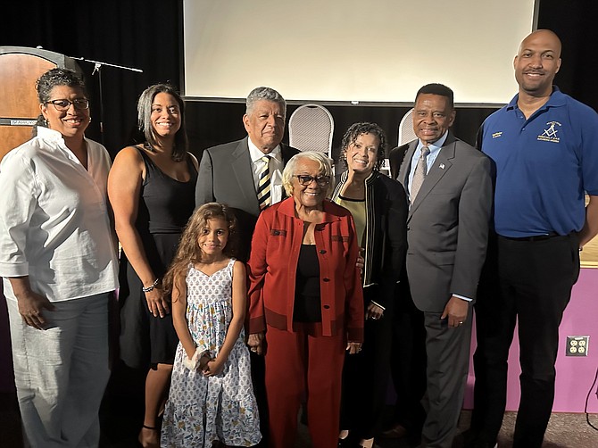 Brig. Gen. Leo A. Brooks Sr. (ret), standing third from left, poses for a photo with family and friends at the 103rd anniversary of Parker-Gray High School Sept. 9 at the Nannie J. Lee Center.