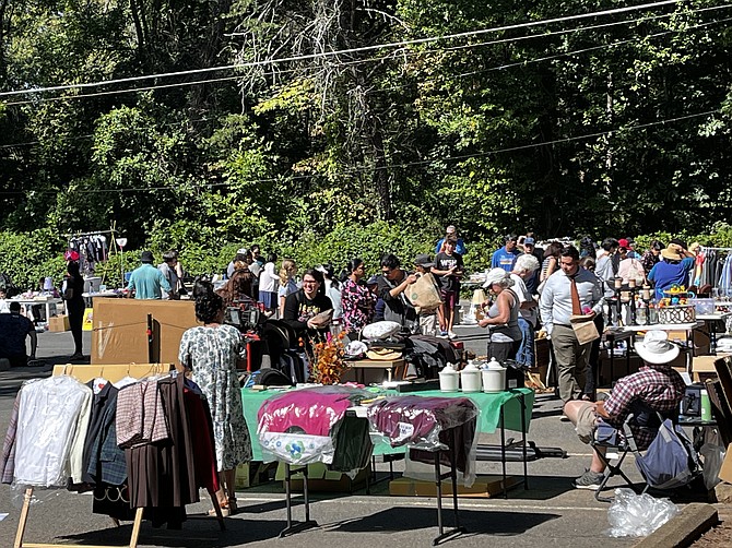 A beautiful afternoon adds to the fun at the McLean Community Parking Lot Sale.