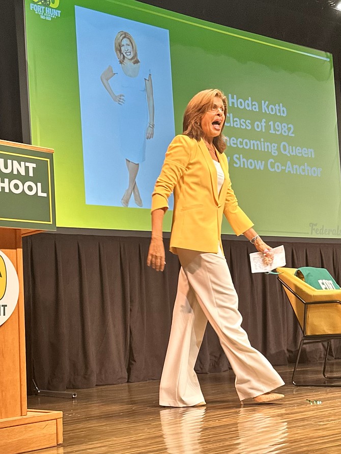 NBC Today Show anchor Hoda Kotb walks onto the stage at the Fort Hunt High School 60th Reunion Sept. 30 at Carl Sandburg Middle School. Kotb was a 1982 graduate of Fort Hunt.