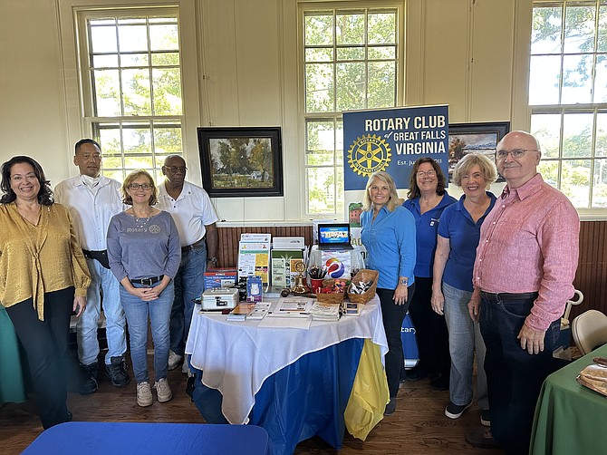 (From left) June Melloni Kelly, president-elect; Jeff Pan; Elizabeth Bouchard, board member; Wilbert Wilkinson, past president; Teresa Rutledge board member; Connie Sawtell president; Eileen Curtis, past president and David Hunt