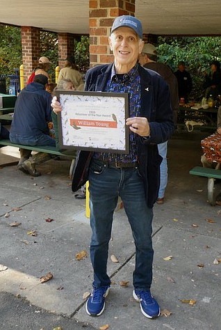 William Young with his Audubon Society of Northern Virginia (ASNV) Volunteer of the Year Award Sunday Oct. 22 at Glencarlyn Park.