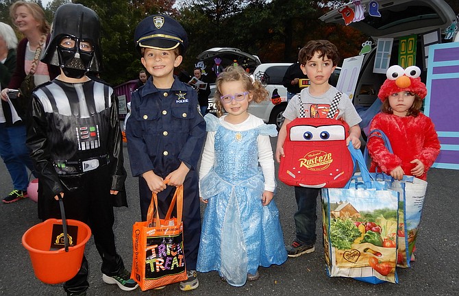 Posing in costume are (from left) Nicolas Harris, 5; Ben Roth, 5; Miriam Roth, 3; Benjamin Wollek, 5; and Margaux Wollek, 5.