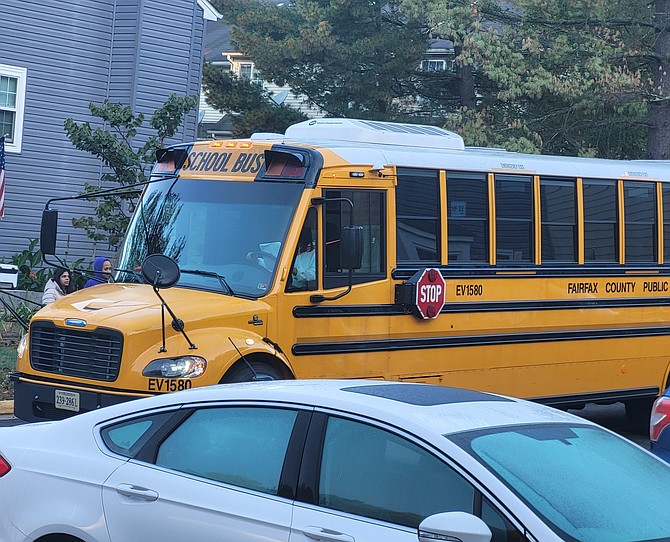 The EV1580 quietly picks up students in Newington.