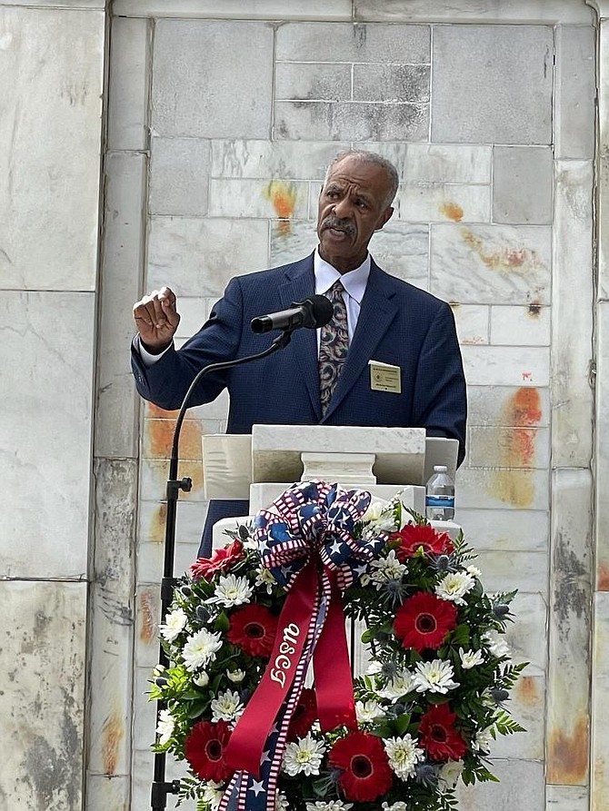 McArthur Myers speaks at the wreath laying ceremony honoring the United States Colored Troops Oct. 28 at Alexandria National Cemetery.