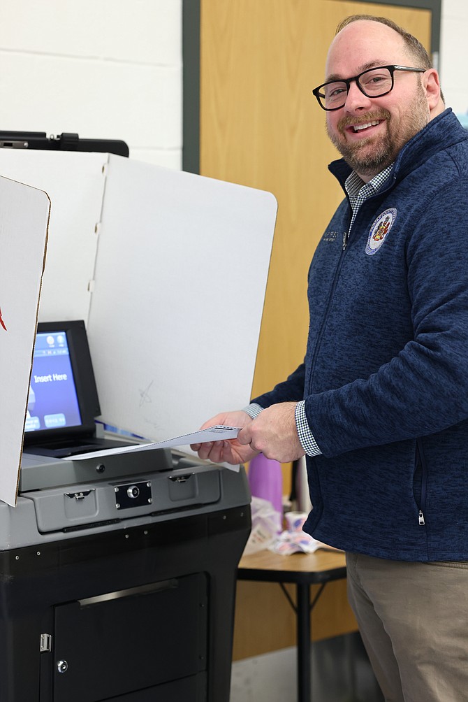 Karl Frisch, vice chair of the Fairfax County School Board cast his ballot on Tuesday, Nov. 7.
