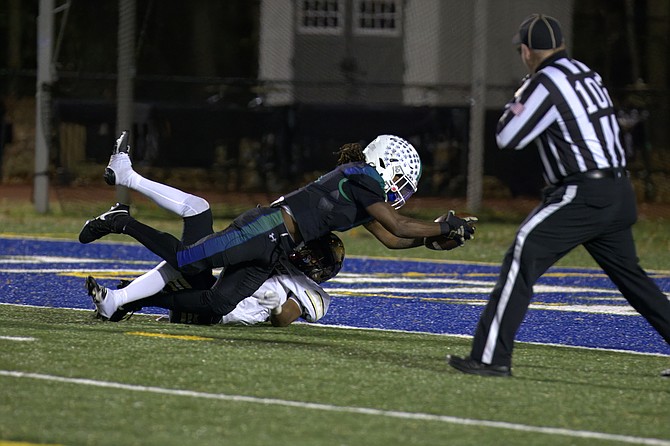 Brian Kennedy #5 stretches out for a South Lakes touchdown.