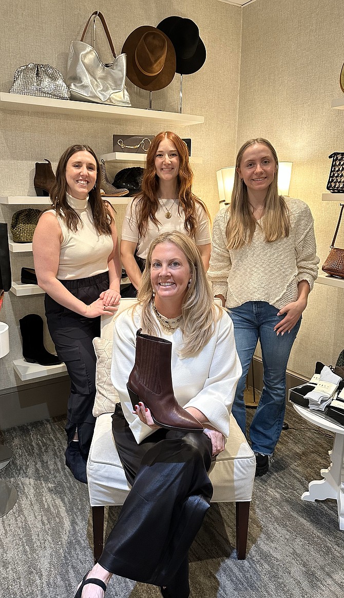 Shoe Hive Boutique owner Elizabeth Todd, seated, celebrates the 20th anniversary of the Old Town shop Oct. 12 with Shannon Donlevie, Annette Ayrapetia and Phoebe Schultz.