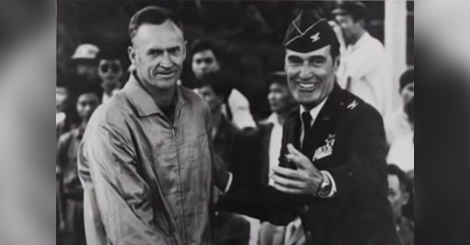 Capt. Eugene “Red” McDaniel, left, is shown after his release in 1973 following six years of captivity during the Vietnam War. McDaniel was shot down and captured over North Vietnam in May 1967 and was brutally tortured as a POW at the infamous “Hanoi Hilton” prison.