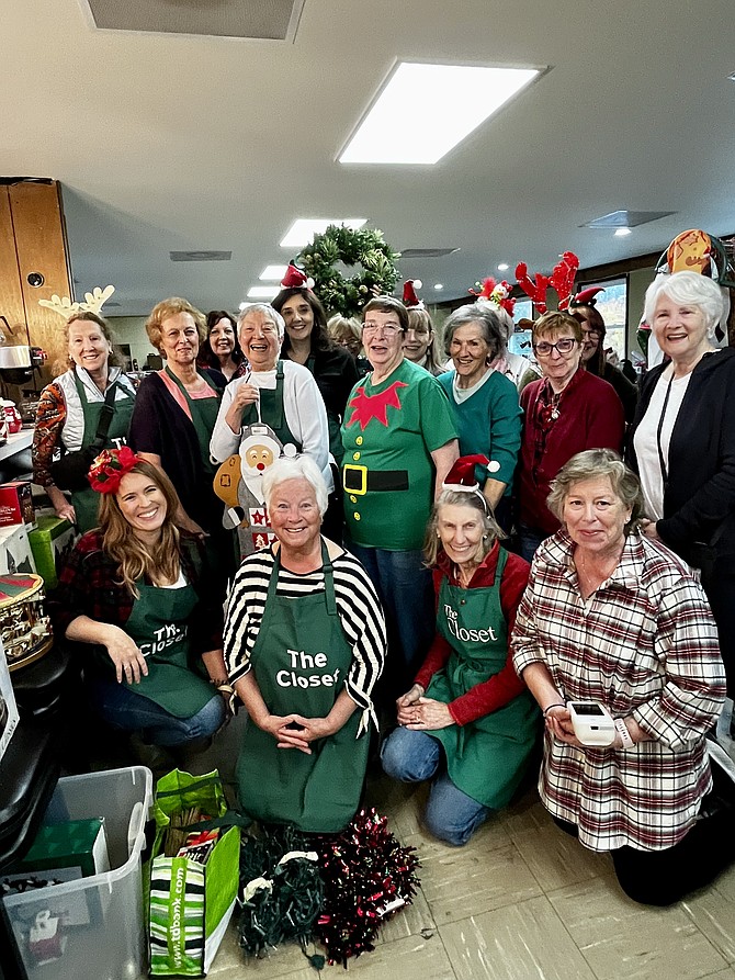 The volunteer elves of The Closet’s Annual Everything Christmas Sale are ready for the rush.