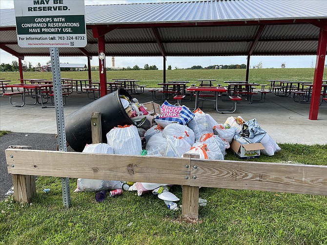 Litter plagues our parks like this piled outside trash cans at Laurel Hill Park in Lorton, attracting vultures, small mammals, and insects; creating a health hazard, burdening tax payers, and detracting from the enjoyment of the park