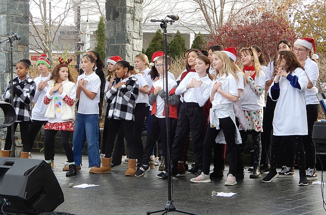 Daniels Run Elementary Singers perform “Rockin’ Around the Christmas Tree.”