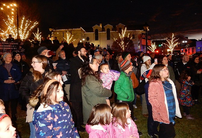 Some of the many people attending the menorah-lighting ceremony.